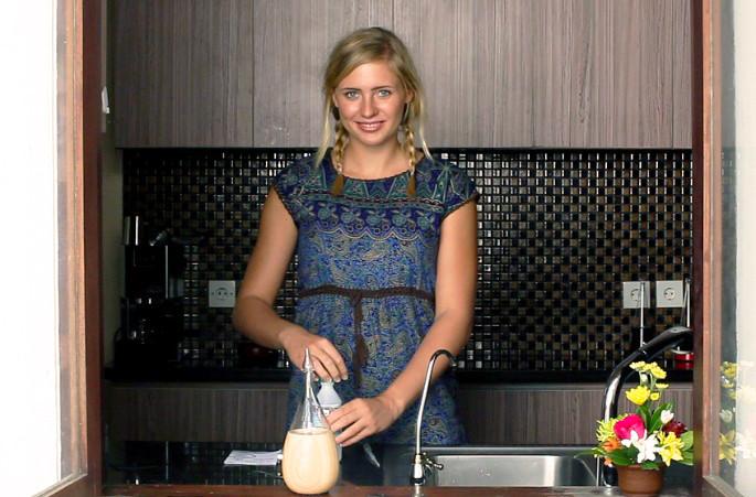 Lady Cleaning the Diffuser with Alcohol