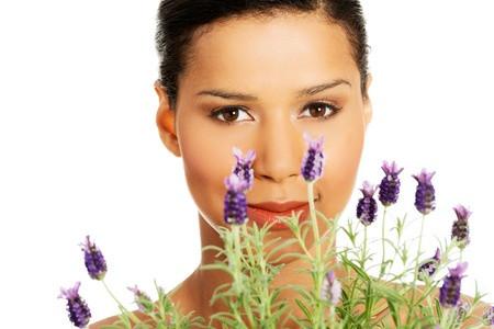 Beautiful Woman Smells Lavender