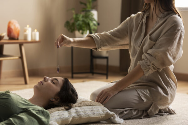 a person conducting reiki therapy