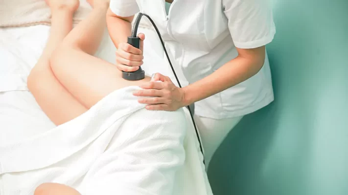 close up photo of a woman getting a reductive reaffirming body treatment