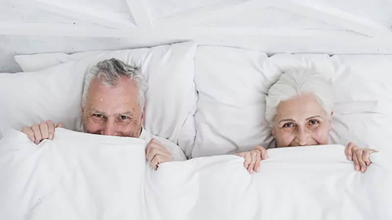 older couple in bed