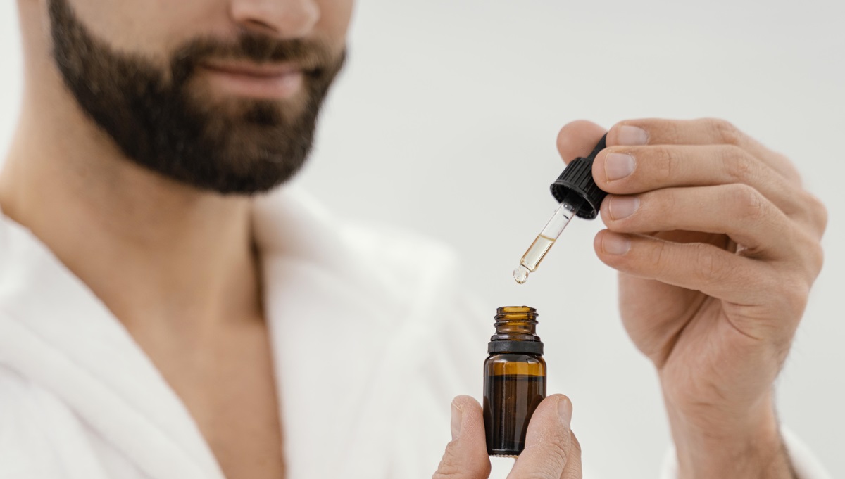 man using essentials for beard care