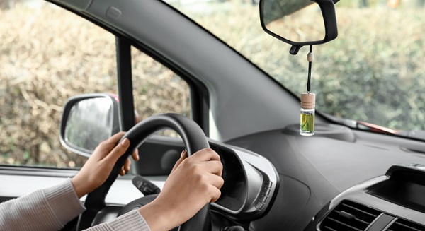 Car diffuser emitting a calming scent