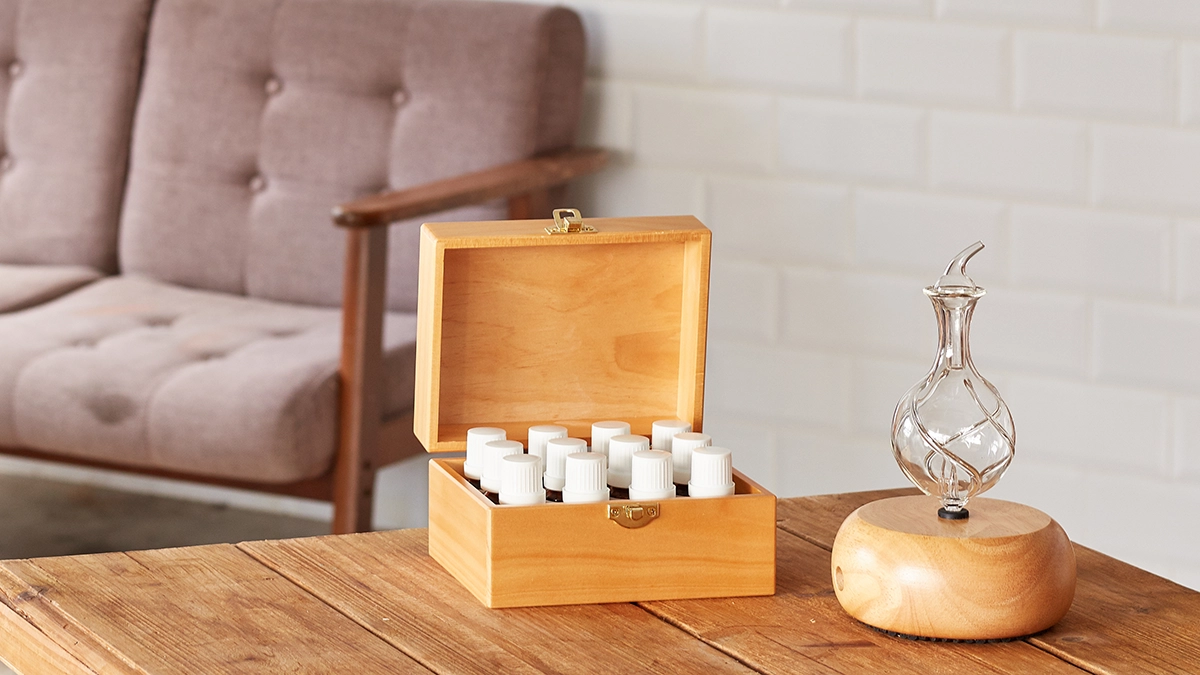 nebulizing diffusers and essential oils on the top of a wooden table
