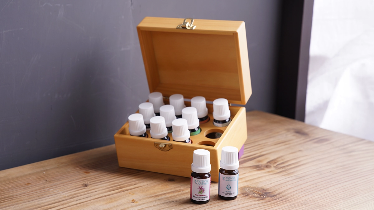 Safety precautions for storage of essential oils Master Aromatherapist Kit on the wood table