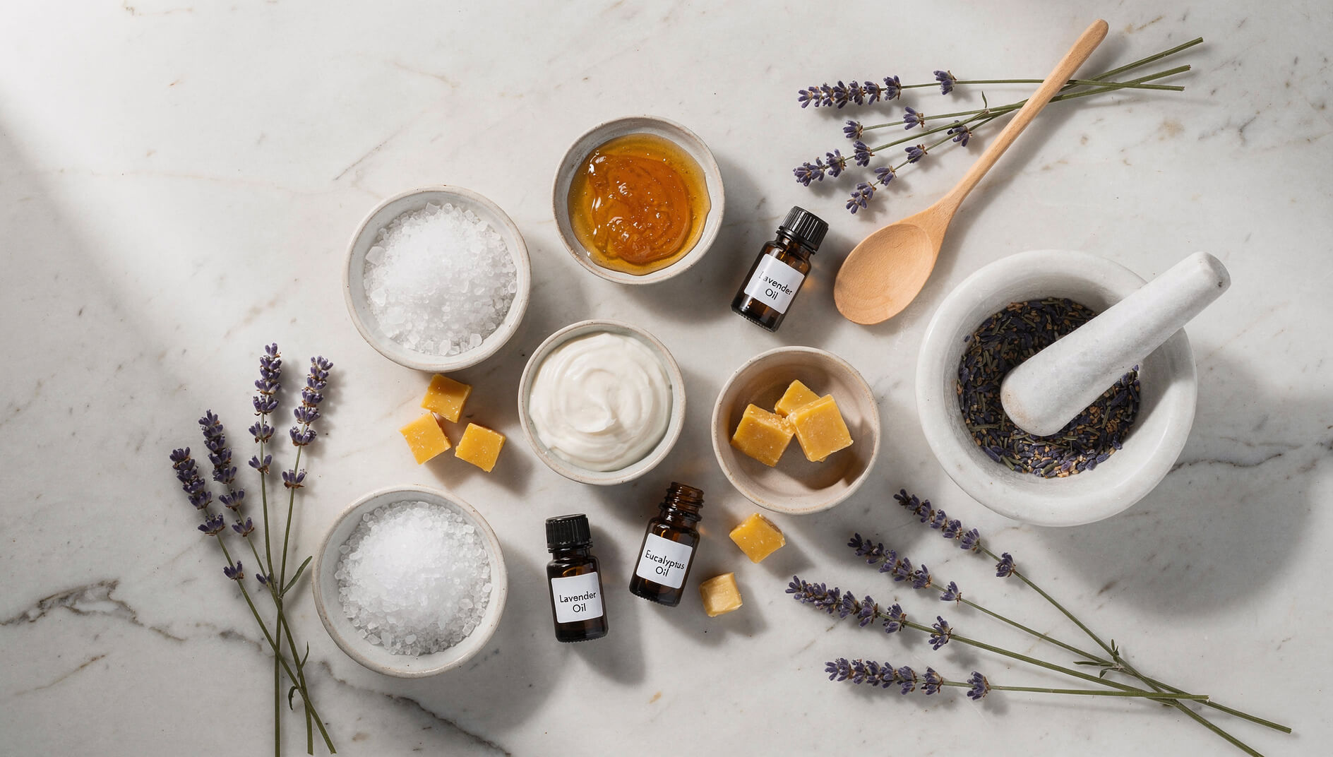 DIY aromatherapy spa treatment ingredients including epsom salt and essential oils