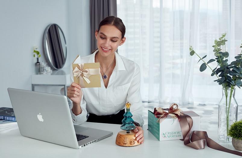 Lady Unboxing a Nebulizing Diffuser